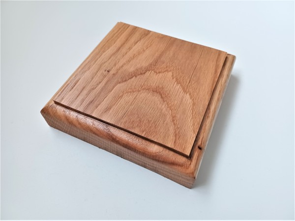 Thick square ceiling pattress manufactured from Oak. Approx. width 125mm oiled