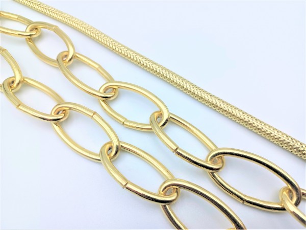 Half meter of brass plated chandelier chain and brass effect silk braided flex. 